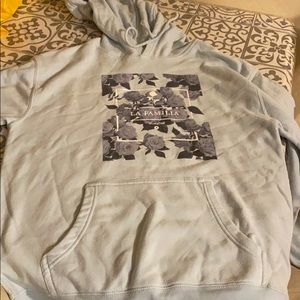Blue La familía pull over hoodie
